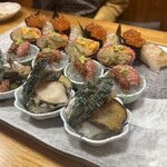 築地 銀平鮨 - 手前から)   鮑の酒蒸し、朝どりの生しらす、雲丹と天然子持ち昆布、海老、いくら