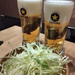 ねぎま 三ぞう - お通し·サッポロ黒ラベル(生)