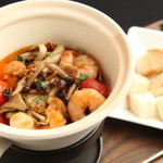 Ethnic Cuisine Ajillo with shrimp and squid