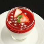 Coconut pudding with strawberries and black Bubble tea