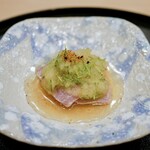 Tomura