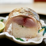 Tomura