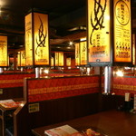 松本酒場　情熱ホルモン - 系列店の店内です。