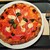 PIZZA TIMEWARP ∈ LACERBA - 料理写真:焼きたてが提供される本格ナポリピッツァ、トマトソースにモッツァレラ、バジルの定番マルゲリータ1,716円