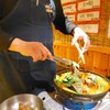 テンチョ - 骨付き豚肉をほぐしていきます