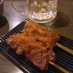 串焼き 一心 - さがりのニンニク醤油(250円)、はらみ串ニンニク醤油(250円)