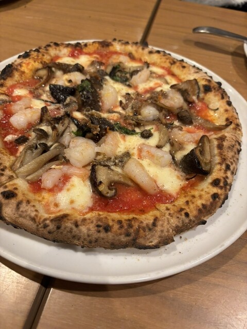 ナストロ  - 鏡石（ピザ）の写真