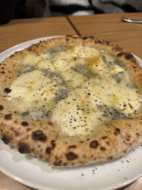 ナストロ  - 鏡石（ピザ）の写真