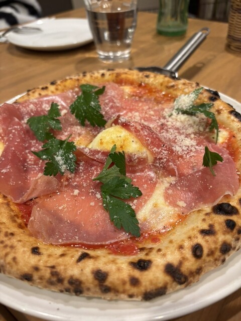 ナストロ  - 鏡石（ピザ）の写真