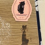 art café 夢二 - ブロマイドとは別に黒の助が刺さっているし、皿にも刻印されている。