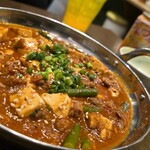 ニュー★サカバ - 四川マーボー豆腐10辛。見た目より辛いかも。でも、味は分かるし美味しかった！辛いの得意ではないけれど、何度も蓮華で掬い上げてました