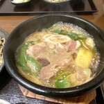 そば芳 - 炎の器で食べる、鴨汁つけそば。のつけ汁。グツグツで来ます。