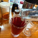 柿島屋 - グラスに焼酎とぶどうエキスがぴったり収まります