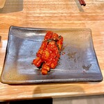 豚焼肉 グルマンズ - サービスのゴボウキムチ。食べかけ。もっと量多かった。美味い。