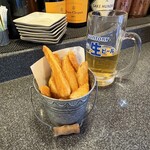 鉄板居酒屋こざら - スパイシーポテト