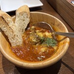 イタリアン大衆酒場HARUTA - お通しのもつトマト煮込み