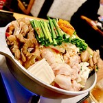 元祖トマトラーメンと辛麺と元祖トマトもつ鍋 三味 天神大名中心店 - 