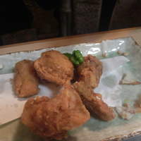 冨士屋本店 - ふぐ唐揚げ（食べかけですみません）