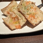 日本橋レオン - パンコントマテ。パンにトマトとニンニク擦り付けて焼くだけ。シンプルながら美味しいおつまみ。