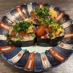 すし処 つどい - つどい巻き　トロとウニと卵黄の贅沢なハーモニーをこれまた極上のシャリが支える贅沢な一品。