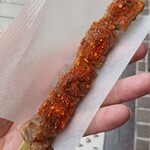 寺子屋本舗 - 料理写真:串ぬれおかき（一味にんにく）＠￥300円