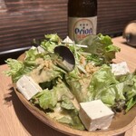 地鶏と沖縄琉球しゃぶしゃぶ 個室居酒屋 くろ凪 - 島豆腐の胡麻サラダ