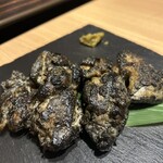 地鶏と沖縄琉球しゃぶしゃぶ 個室居酒屋 くろ凪 金山店 - 地鶏の網焼き