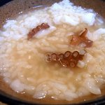 酒肴 和亭 - 実は雑炊用にタコを少し残していたんですよね。タコ雑炊の出来上がりです。タコとご飯をサラサラってかきこみながら食べましたよ。タコ出汁の旨味がよく出ており美味しくいただけました。