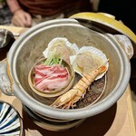 いかの墨 - お通しは、選んだ食材を土鍋で酒蒸しに！