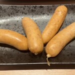 WAGYU焼肉悠雅 - ビールが飲みたくなるウィンナーピリ辛　確かにー。