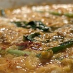 近江牛ホルモン いるもん - 卵を溶いて‥  追いごま油か香り高くめっちゃ美味しかった