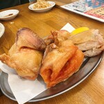 餃子のネオ大衆酒場 ニューカムラ - 四日仕込み一夜干しひな鶏の半身揚げ