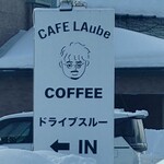 Cafe LAube - いつもの看板を赤信号で止まった場所から望遠でパチリ
