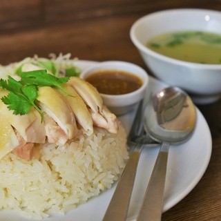 Our famous Khao Man Gai! You'll definitely get addicted to the homemade sauce!