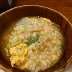 鴨料理 呂尚 - 締めの雑炊　一度鍋を回収し 調理した状態で再度提供されます