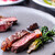 THE CITY BAKERY TRATTORIA RUBIN 仙台 - 料理写真:玄米牛のビステッカ　黒ニンニクピューレ添え