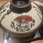 赤から 渋谷店 - 赤からオリジナルのイラスト入り土鍋。