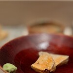 たかおか - あん肝。 柔らかく、甘く煮られてほわほわ。 わさびもいいけど、わずかに塩のせると抜群な味わいに変化します。