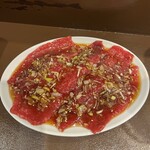 高円寺 焼肉ここち - ◯ロース¥1,600
      …薄切りのロース肉にネギだれがかけられています。