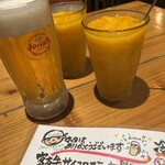 居酒家 でいりぐち - オリオンドラフト/マンゴージュース(果肉入り)