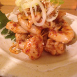 杉田もつ肉店 - 辛いタレに小袋刺し