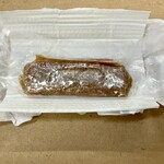 まいばすけっと - 料理写真:開いて…どうやって食べるの？と暫し悩みました。オブラートに包まれてるいるので、そのまま食べられました。柔柔でヌガーの様な状態です。