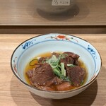 京洛燒肉Yabu - 【 お通し 】和風出汁でゆっくり煮込まれたタン先。柔らかく味が染み染みで旨い