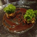 エノテカ・ラ・リコルマ - 函館産真タラ白子の香草パン粉焼き　スパイシーなドライトマトと赤ワインソース