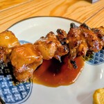 串屋横丁 - 名物大トロBIGホルモン豚赤ダレ320円