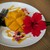 Blue Turtle Farm Mango Cafe - 料理写真:友人のマンゴーはフレッシュには比べられませんが、見た目も華やかで添えられたアカバナも宮古島らしくてよい感じでした。
          