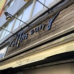 ラッフルズ カリー - 入り口上の看板