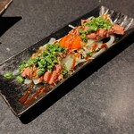 酒呑倶楽部 つなよし - 道産牛の炙りカルパッチョ濃厚卵黄のせ