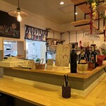 Italian Shokudo Shu - A clean and comfortable space with counter and table seating, perfect for solo diners.