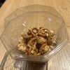 シアタス心斎橋 - キャラメルとプレッツェルのポップコーン(食べかけ)